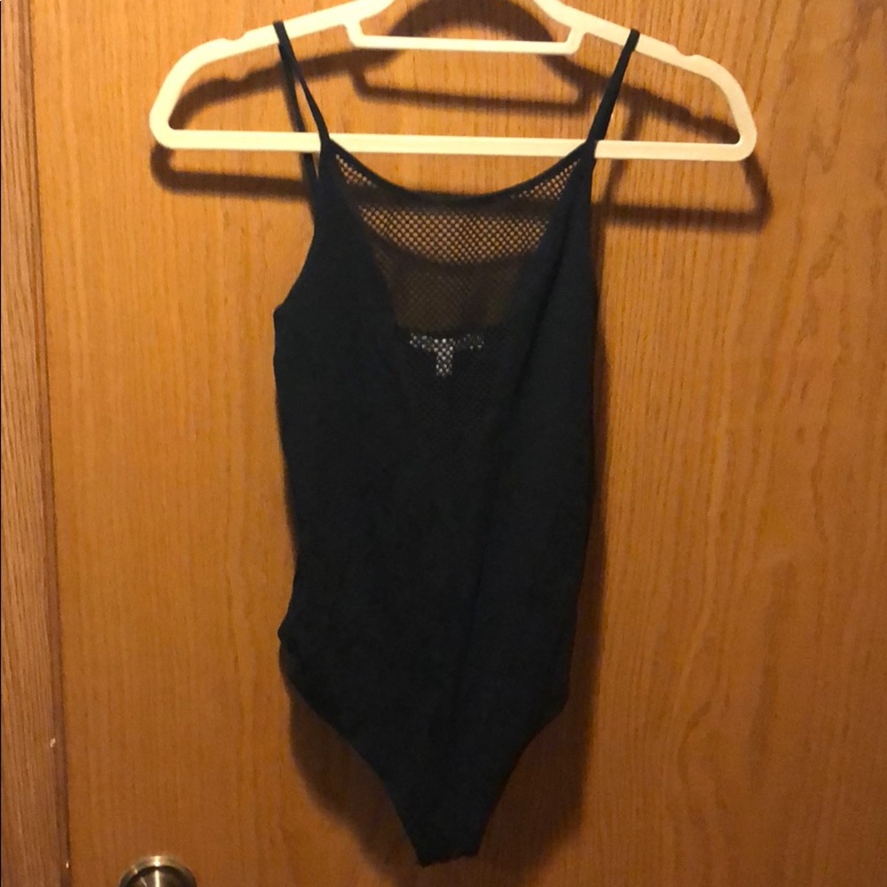 Black fishnet body con